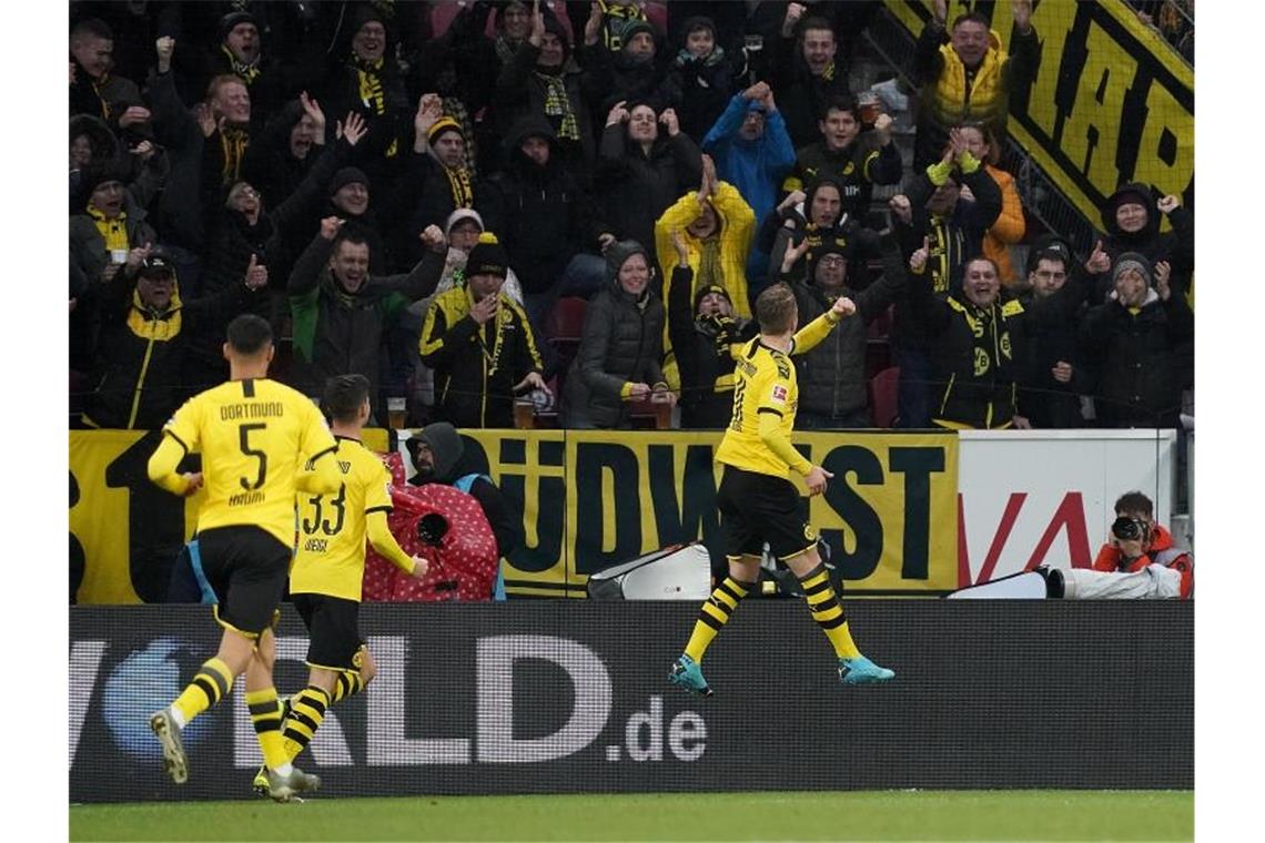 BVB heiß auf Leipzig - Reus: „Da wird es sicher brennen“ Die Dortmunder um Marco Reus (r) sind heiß auf RB Leipzig. Foto: Thomas Frey/dpa