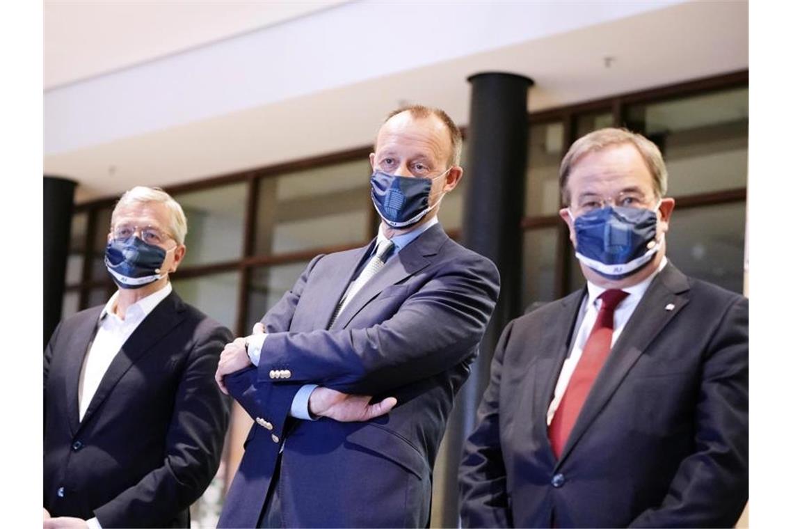 Merz, Laschet und Röttgen im Dilemma Die drei Kandidaten für den Bundesvorsitz der CDU: Armin Laschet, (r-l) Friedrich Merz und Norbert Röttgen. Foto: Michael Kappeler/dpa-pool/dpa