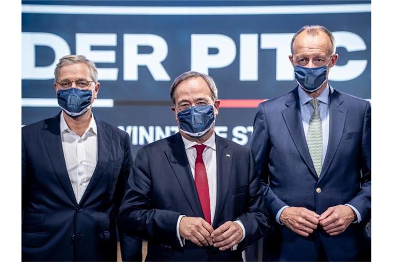 Die drei Kandidaten für den Bundesvorsitz der CDU, Armin Laschet (M), Friedrich Merz (r) und Norbert Röttgen (l). Foto: Michael Kappeler/dpa-pool/dpa/Archivbild