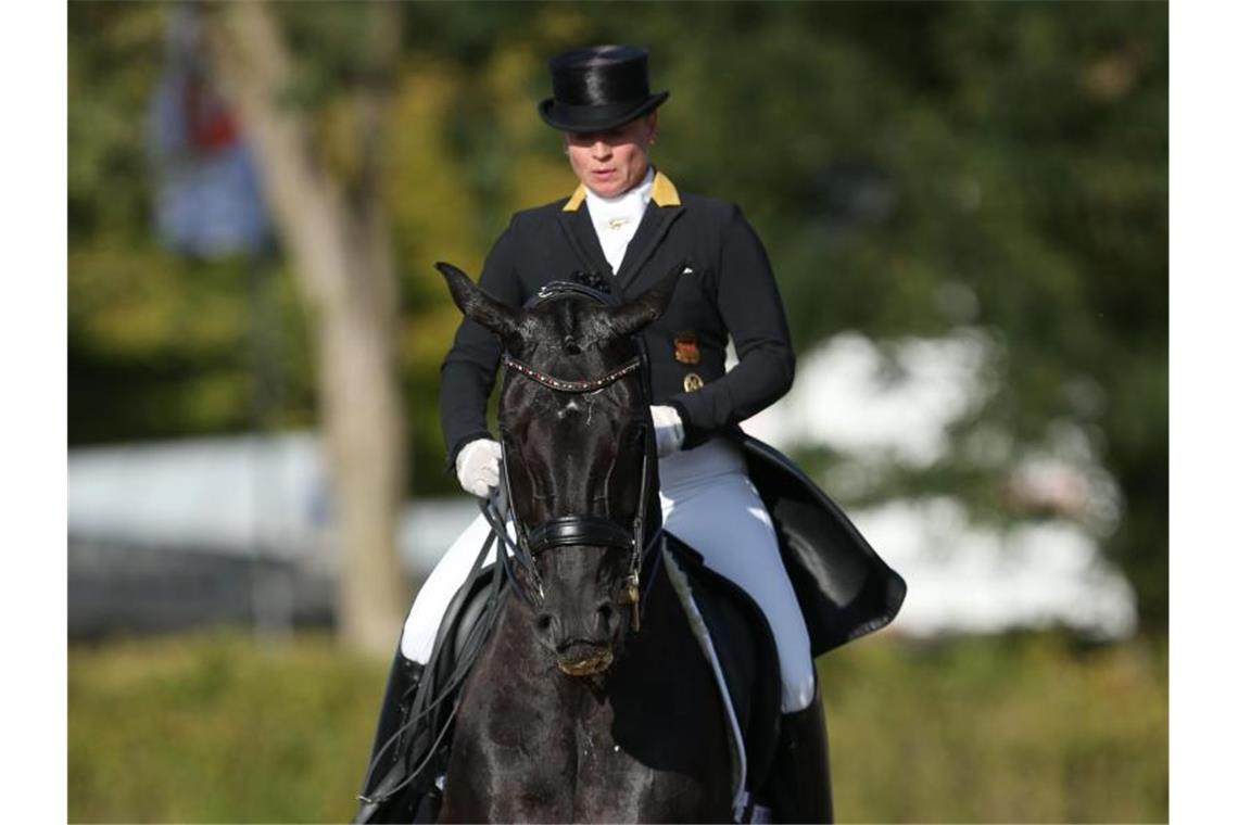 Vier Siege: Dressur-Olympiasiegerin überragt in Mannheim Die Dressurreiterin Isabell Werth. Foto: Friso Gentsch/dpa/Archivbild