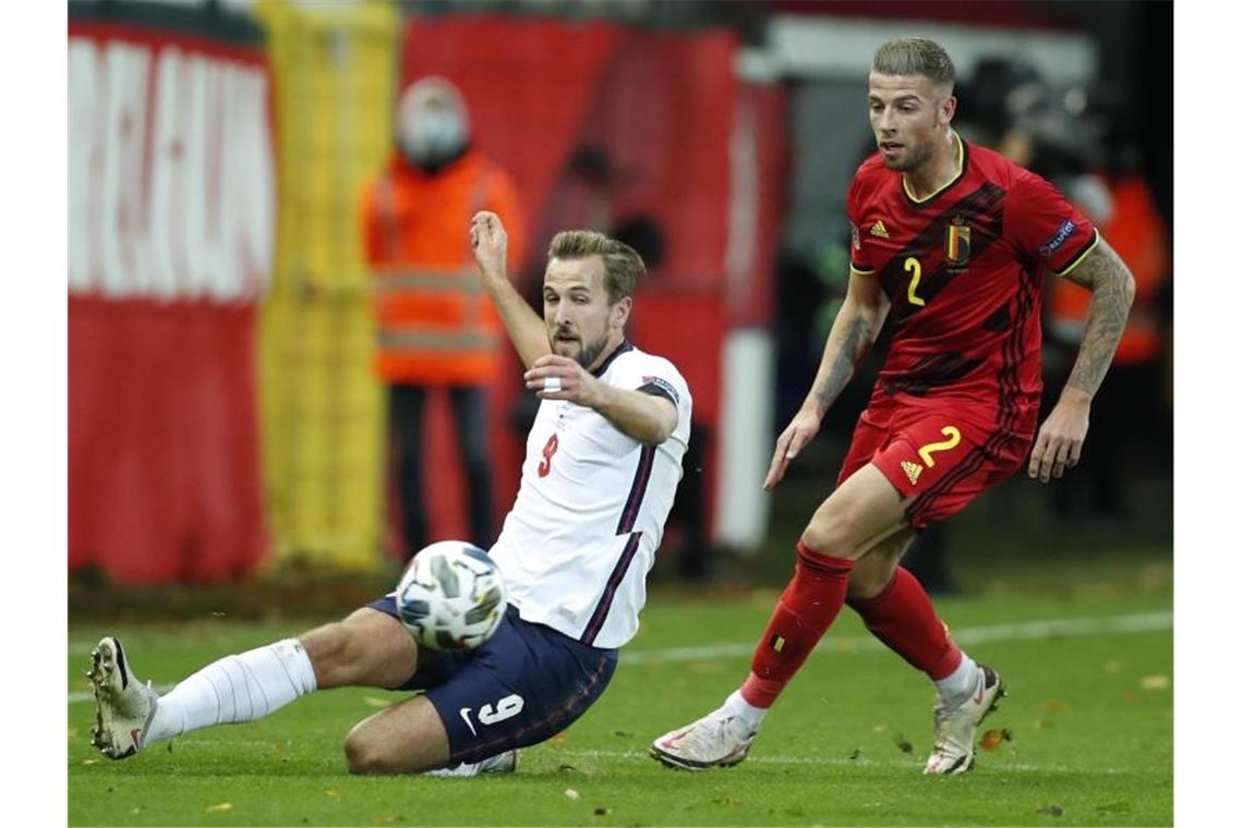 Die Engländer um Harry Kane (l) verloren in Belgien. Foto: Francisco Seco/AP/dpa