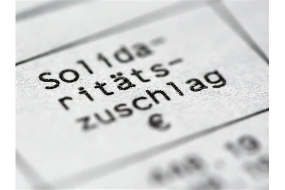 Die FDP fordert eine vollständige Soli-Abschaffung zum 1. Januar 2020. Foto: Roland Weihrauch/dpa