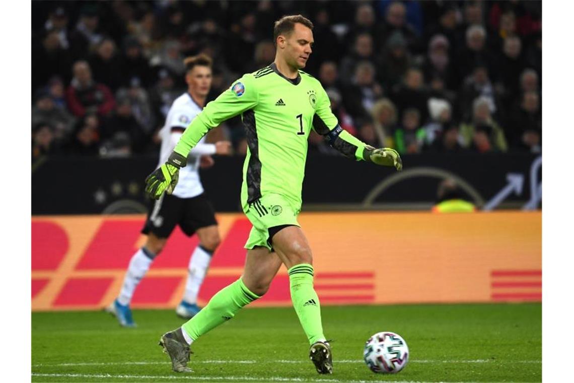 Neuers Teamauftrag: Geschenk für Löw - Kroos muss abreisen Die Fortsetzung seiner DFB-Laufbahn will Manuel Neuer von seiner Verfassung abhängig machen. Foto: Federico Gambarini/dpa