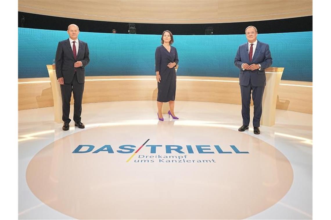 Scharfer Schlagabtausch im zweiten Kanzlerkandidaten-Triell Die Kanzlerkandidaten der SPD, Grüne und CDU: Olaf Scholz, Annalena Baerbock und Armin Laschet treffen in einer TV-Diskussion bei ARD und ZDF aufeinander. Foto: Michael Kappeler/dpa-Pool/dpa