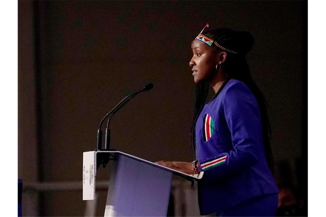 Die kenianische Klimaaktivistin Elizabeth Wathuti spricht während der Eröffnungszeremonie des UN-Klimagipfels COP26 in Glasgow. Foto: Alberto Pezzali/AP/dpa
