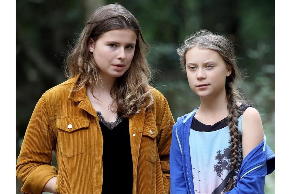 Die Klimaschutzaktivistinnen Luisa Neubauer (l.) und Greta Thunberg. Foto: Oliver Berg/dpa/Archiv