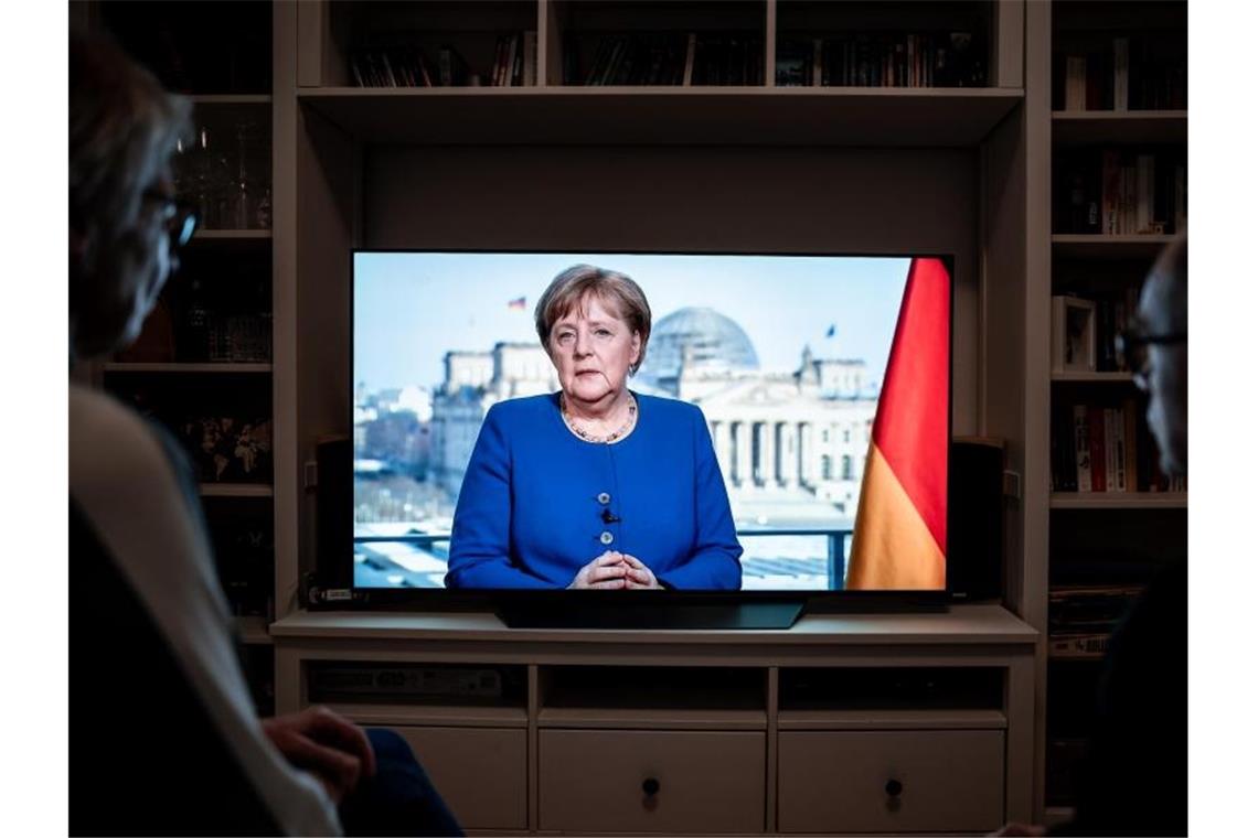 Die Krise habe eine historische Dimension, sagt Merkel in ihrer Fernsehansprache. Foto: Fabian Strauch/dpa