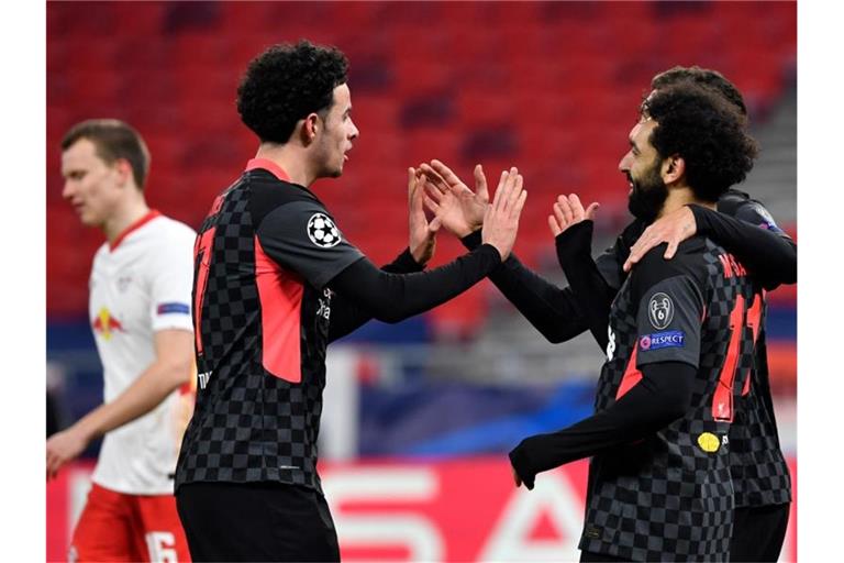 Die Leipziger um Lukas Klostermann (l) mussten sich dem FC Liverpool geschlagen geben. Foto: Marton Monus/dpa