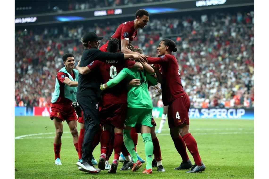 Die Liverpool-Spieler feiern den Supercup-Sieg gegen Chelsea. Foto: Nick Potts/PA Wire
