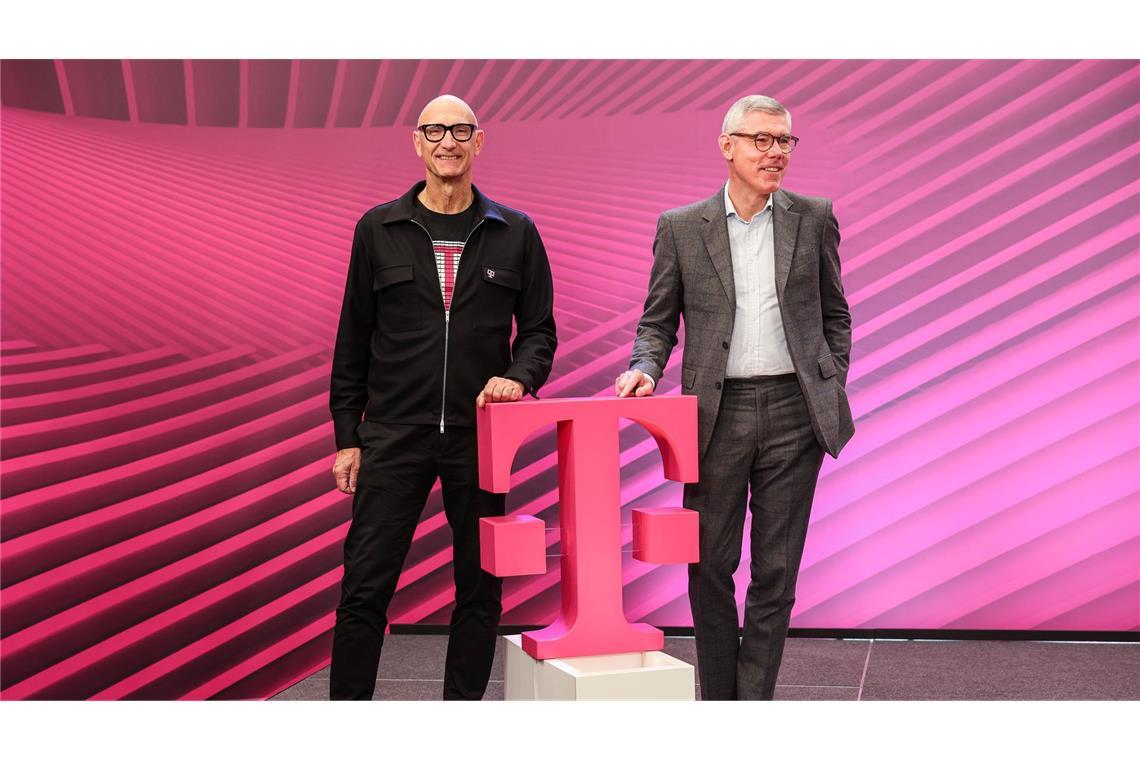 Die Magenta-Manager Tim Höttges (links) und Christian Illek.