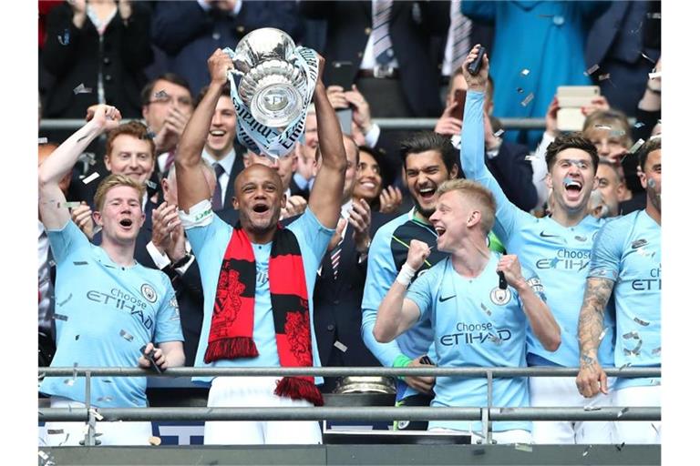 Die ManCity-Spieler feiern den Sieg im FA-Cup-Finale gegen Watford. Foto: Nick Potts/PA Wire