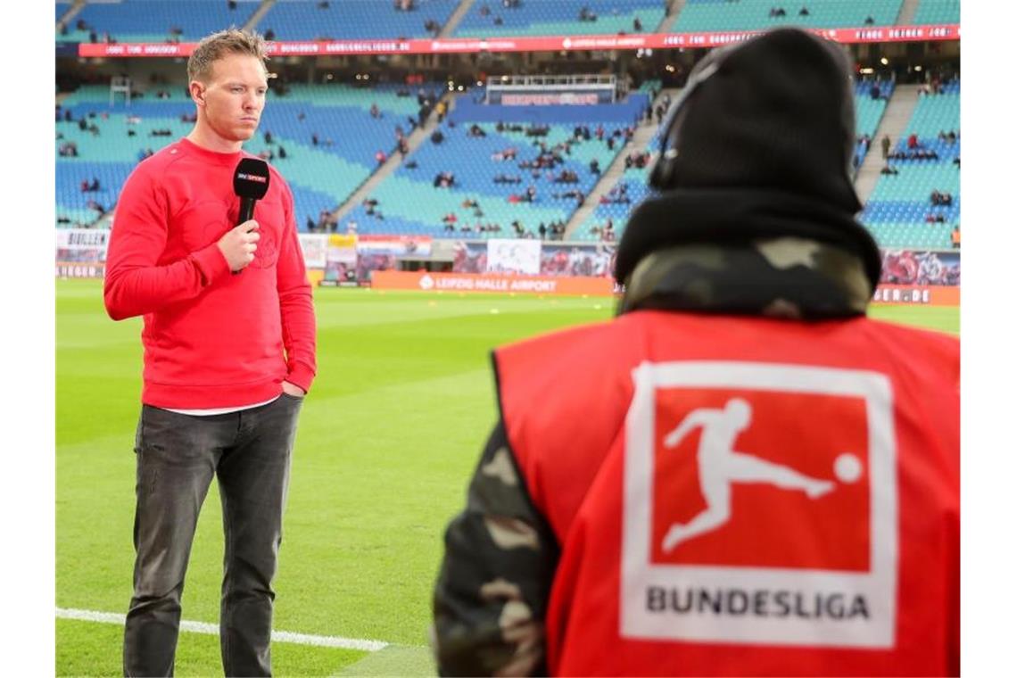 Bundesliga für Fans im TV frei zugänglich - DAZN-Frage offen Die Medienpartner der DFL wollen zum Re-Start der Bundesliga besondere Angebote machen. Foto: Jan Woitas/dpa-Zentralbild/dpa