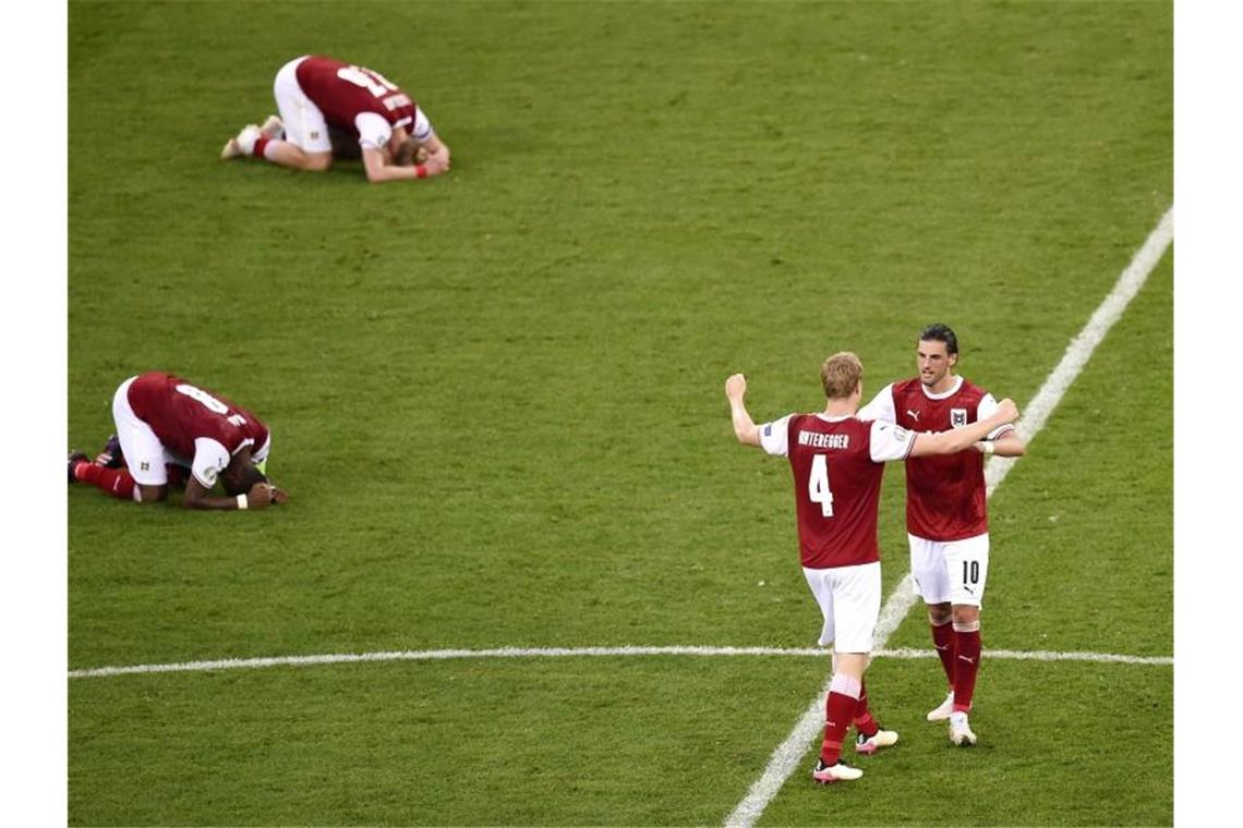 „Historisch!“ Alaba & Co. „träumen“ von Coup gegen Italien Die Österreicher jubelten kurz und bereiten sich nun auf Italien vor. Foto: Mihai Barbu/Pool AFP/AP/dpa