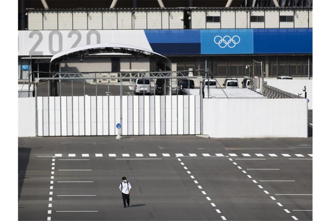 Japan: Zuschauer-Ausschluss bei Olympia möglich Die Olympischen Spiele in Tokio könnten ohne Fans stattfinden. Foto: Hiro Komae/AP/dpa