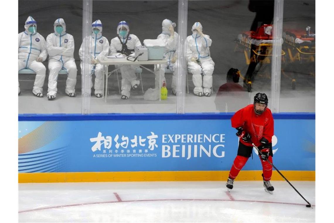 Die Olympischen Winterspiele 2022 stehen ganz im Zeichen der Corona-Krise. Foto: Mark Schiefelbein/AP/dpa