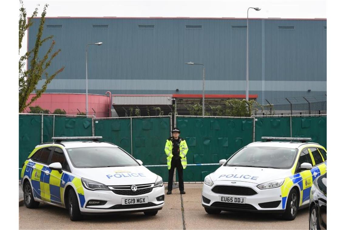 Außenministerium in Peking: Tote im Lkw-Anhänger aus China Die Polizei nahm einen 25 Jahre alten Mann aus dem britischen Nordirland fest. Foto: Stefan Rousseau/PA Wire/dpa