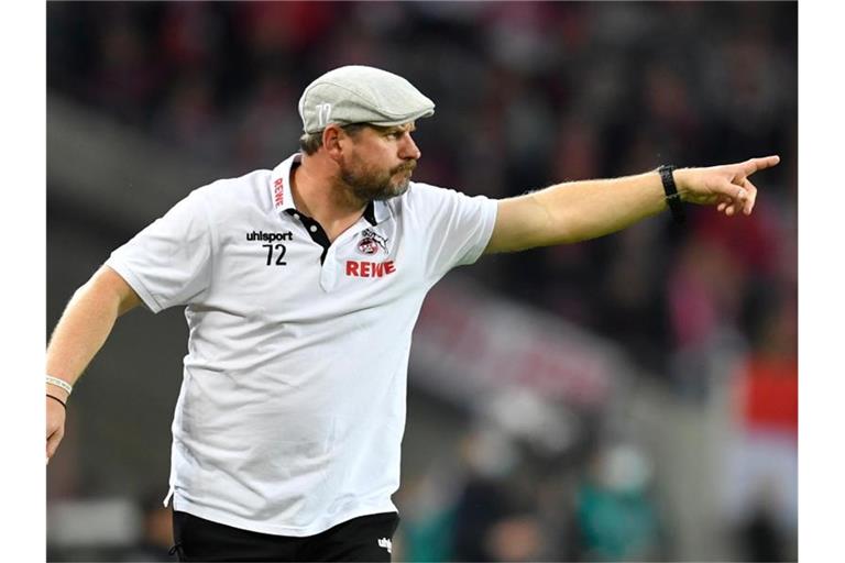 Die Schiebermütze von Kölns Trainer Steffen Baumgart wurde zum Verkaufsschlager. Foto: Marius Becker/dpa
