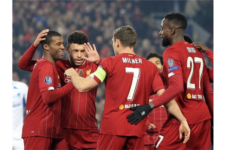 Die Spieler vom FC Liverpool feiern das 1:0 gegen Genk. Foto: Jon Super/AP/dpa