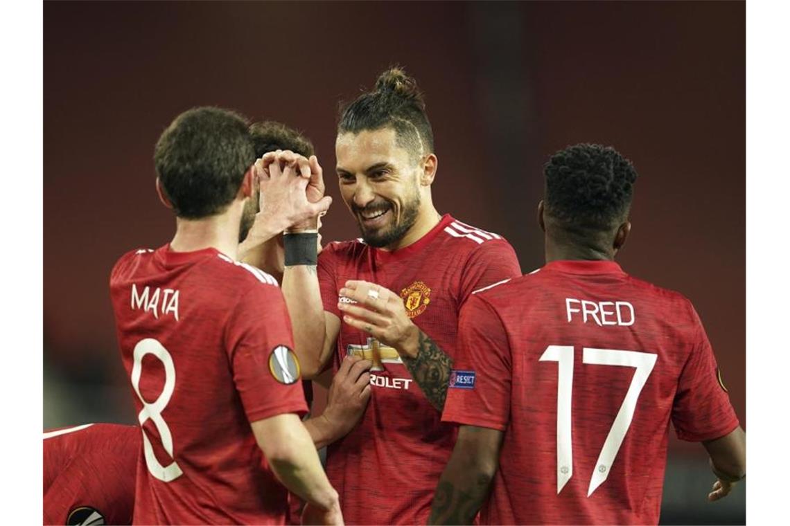 Man United, Villareal, AS Rom und FC Arsenal im Halbfinale Die Spieler von Manchester United freuen sich über den Einzug ins Halbfinale der Europa League. Foto: Dave Thompson/AP/dpa