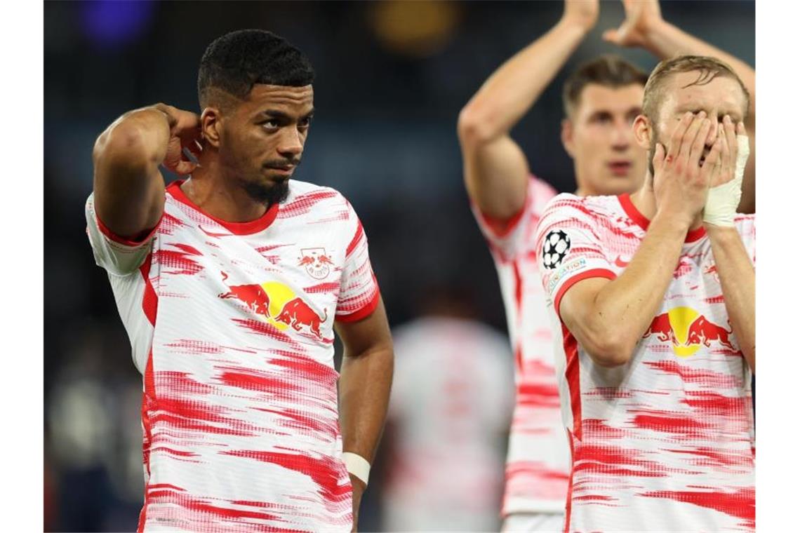 RB Leipzig zittert um Europa - Mbappé beeindruckt Die Spieler von RB Leipzig hadern nach dem Spiel mit der Niederlage. Foto: Jan Woitas/dpa-Zentralbild/dpa