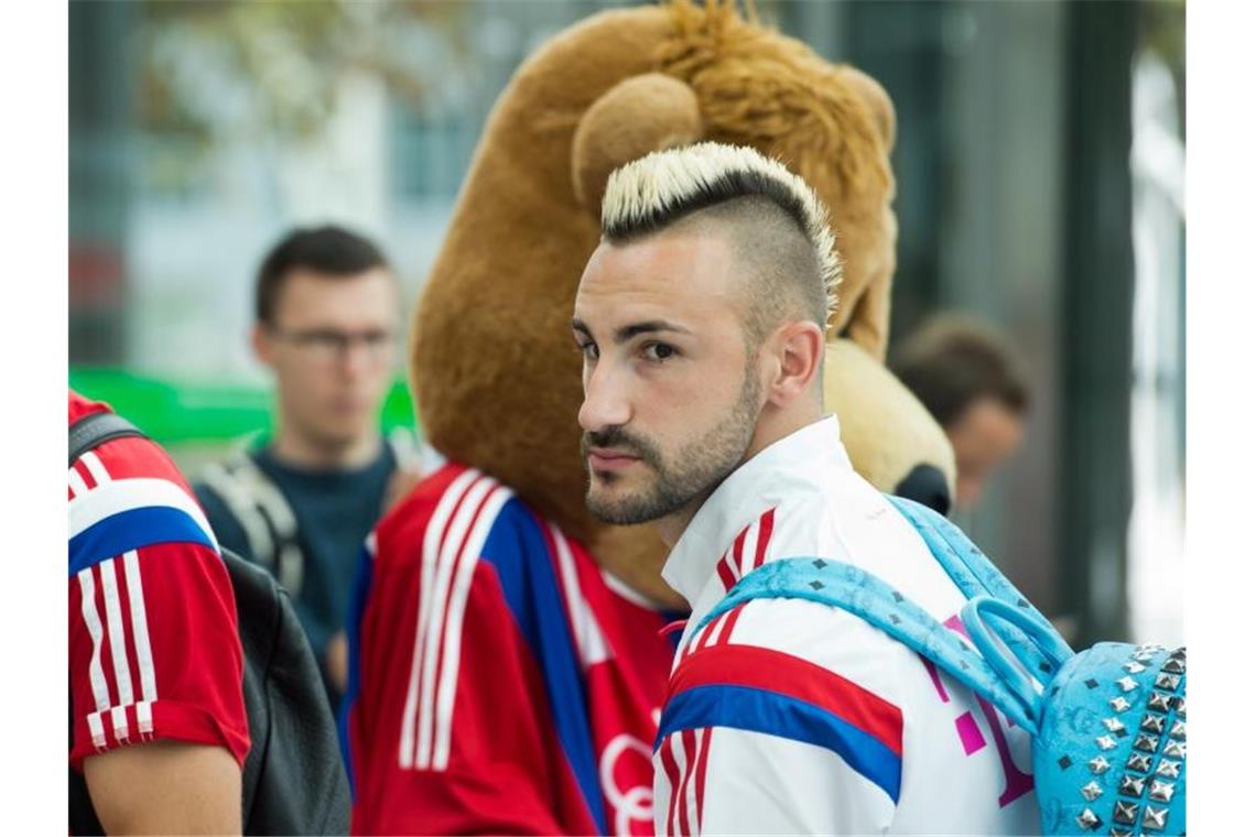 Diego Contento mit einem Trainingsanzug bekleidet. Foto: picture alliance / dpa/Archivbild