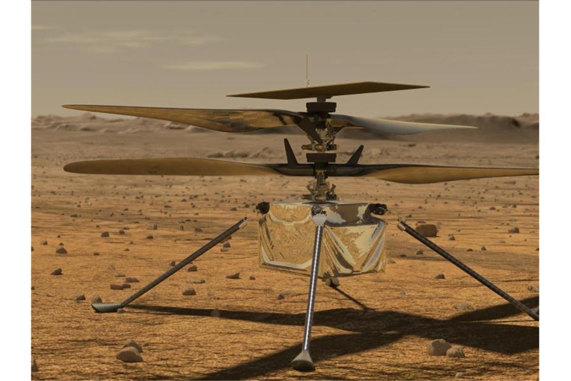 Mars-Hubschrauber „Ingenuity“ hebt erstmals ab Diese von der NASA zur Verfügung gestellte Illustration zeigt den Mini-Hubschrauber „Ingenuity“ auf der Marsoberfläche. Foto: Jpl-Caltech/NASA/ZUMA Wire/dpa