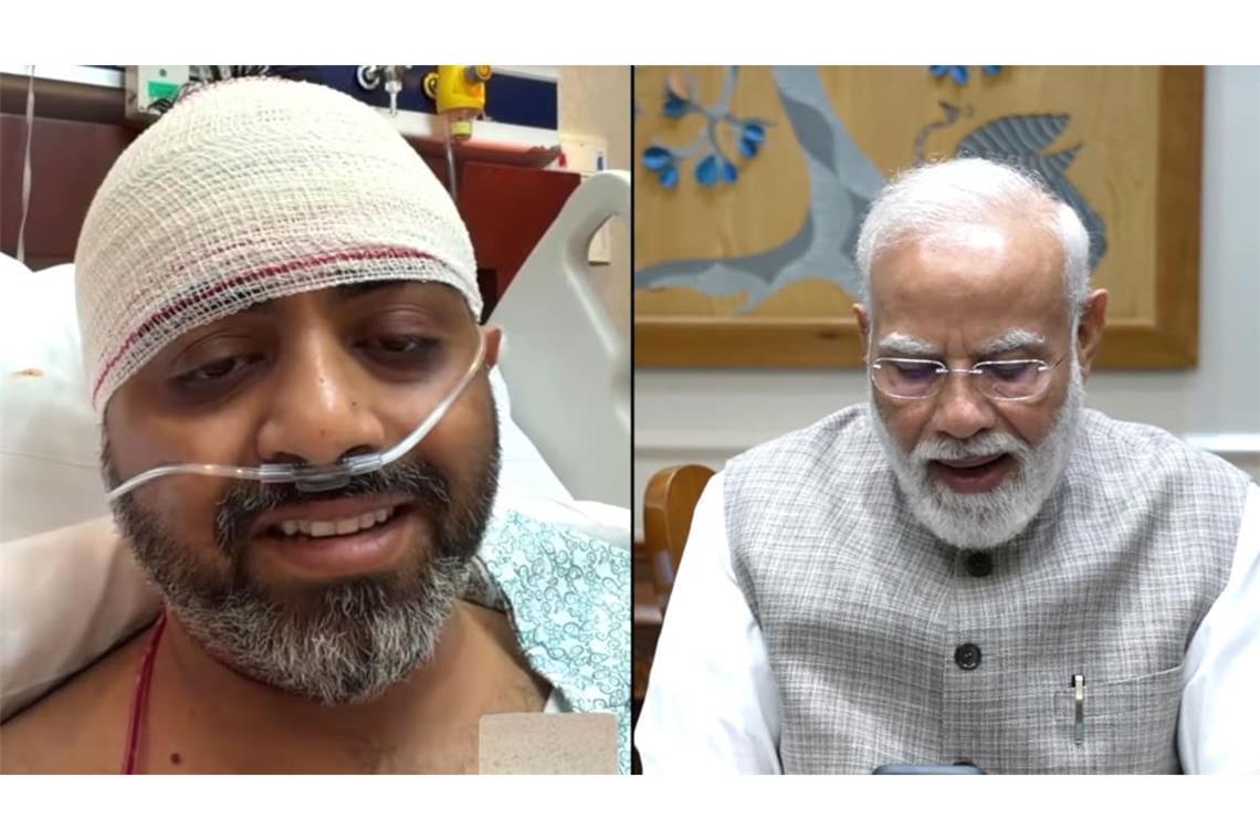 Dieser Screenshot des YouTube-Kanals von Narendra Modi zeigt den indischen Ministerpräsidenten Narendra Modi (r) im Gespräch mit dem Flydubai-Piloten Smit Machchhar.