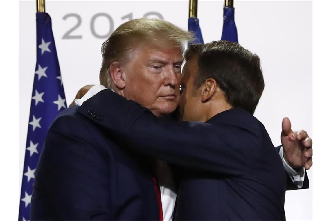 Donald Trump und Emmanuel Macron beim Ende einer gemeinsamen Pressekonferenz. Foto: Francois Mori/AP
