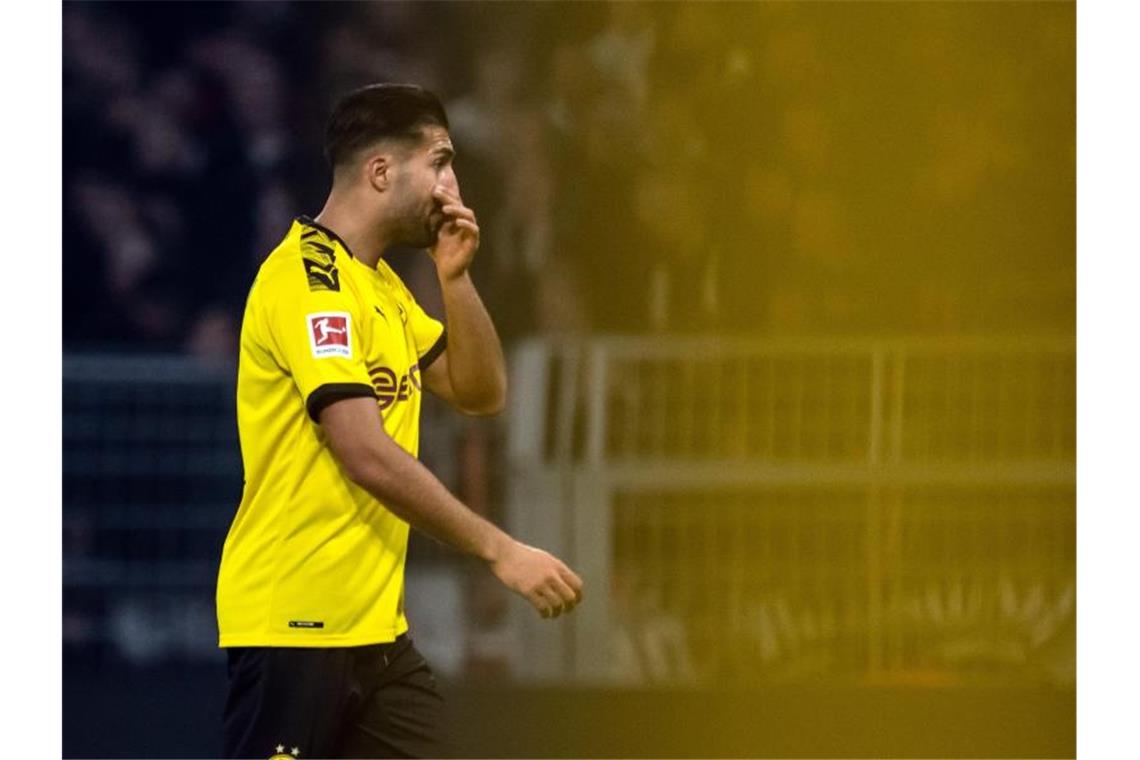 BVB-Personalsorgen vor Geisterderby gegen Schalke Dortmunds Emre Can wird gegen Schalke nicht spielen können. Foto: Bernd Thissen/dpa