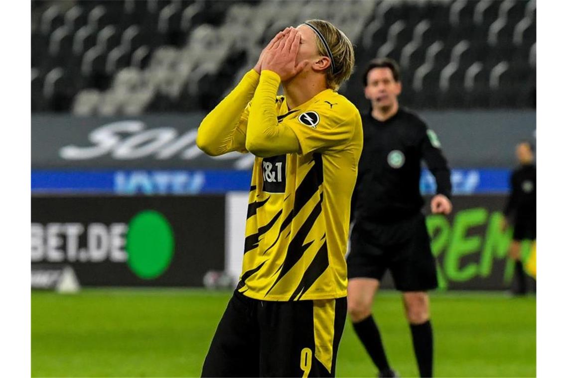 Dortmunds Erling Haaland reagiert enttäuscht nach dem Spiel. Foto: Martin Meissner/Pool AP/dpa