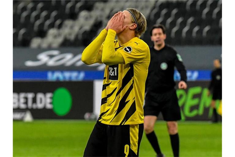 Dortmunds Erling Haaland reagiert enttäuscht nach dem Spiel. Foto: Martin Meissner/Pool AP/dpa