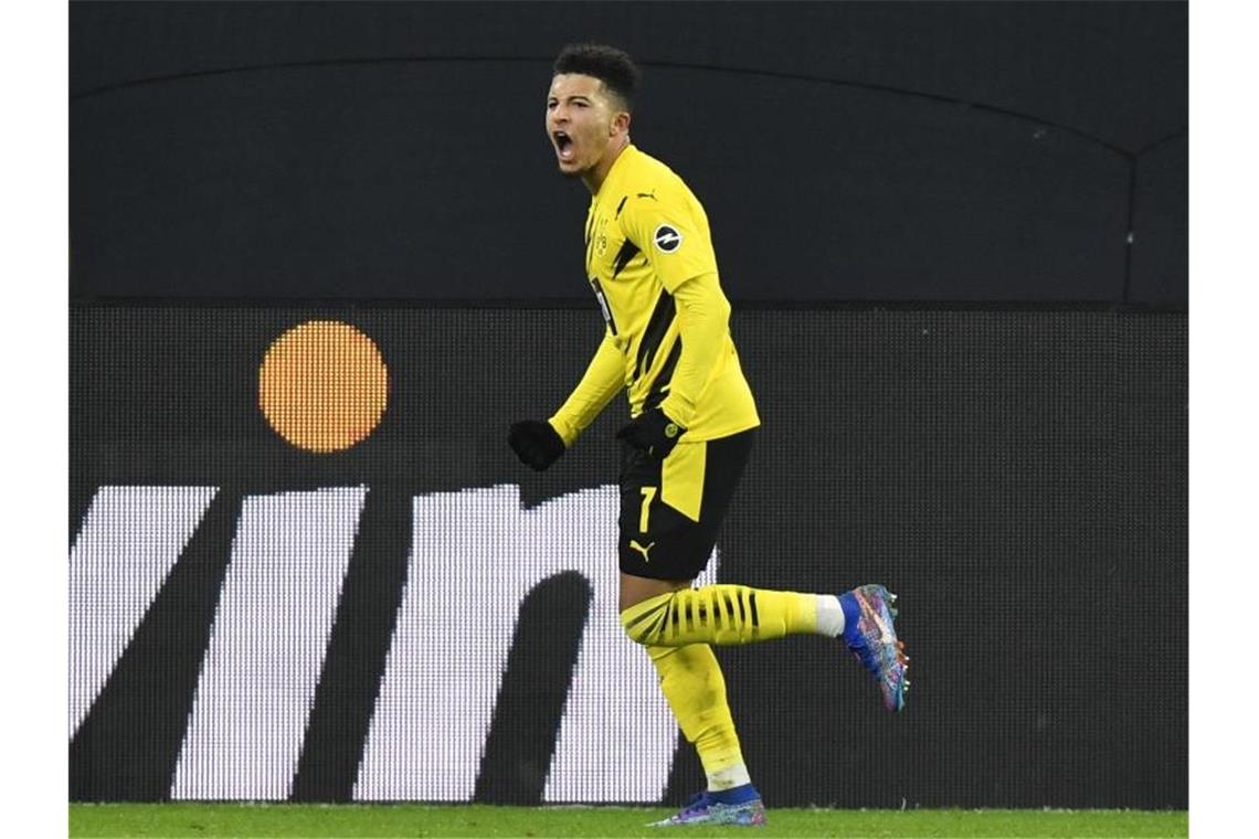 BVB schöpft Mut für den schwierigen Januar Dortmunds Jadon Sancho bejubelt sein Tor zum 2:0. Foto: Martin Meissner/Pool AP/dpa