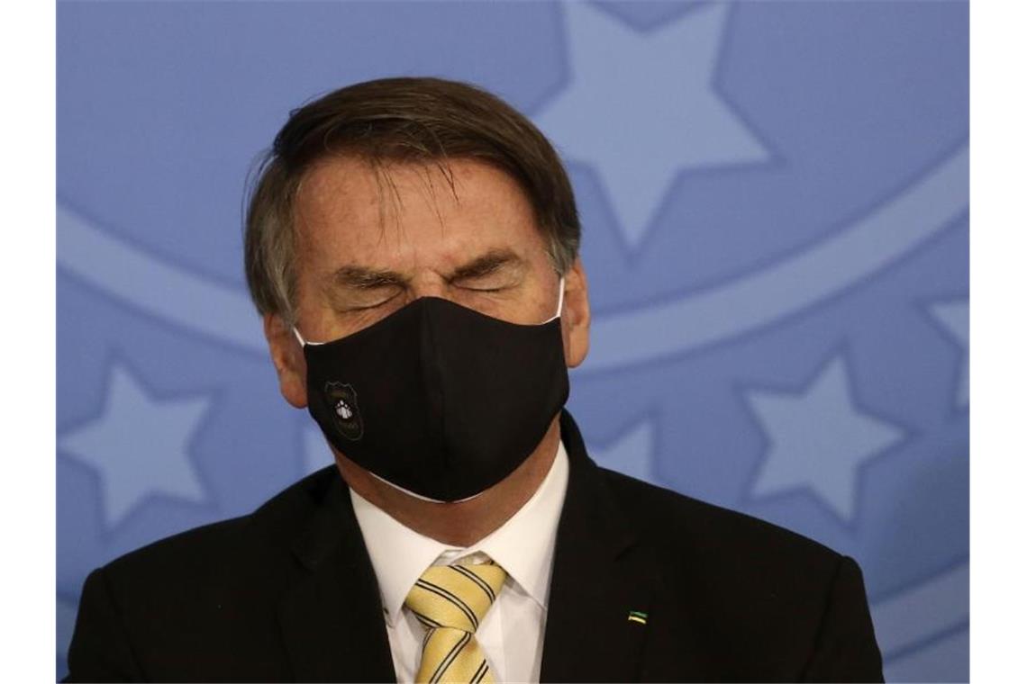Brasilien meldet mehr als 15.300 neue Corona-Fälle Drängt auf eine Rückkehr zur Normalität: Präsident Jair Bolsonaro. Foto: Eraldo Peres/AP/dpa