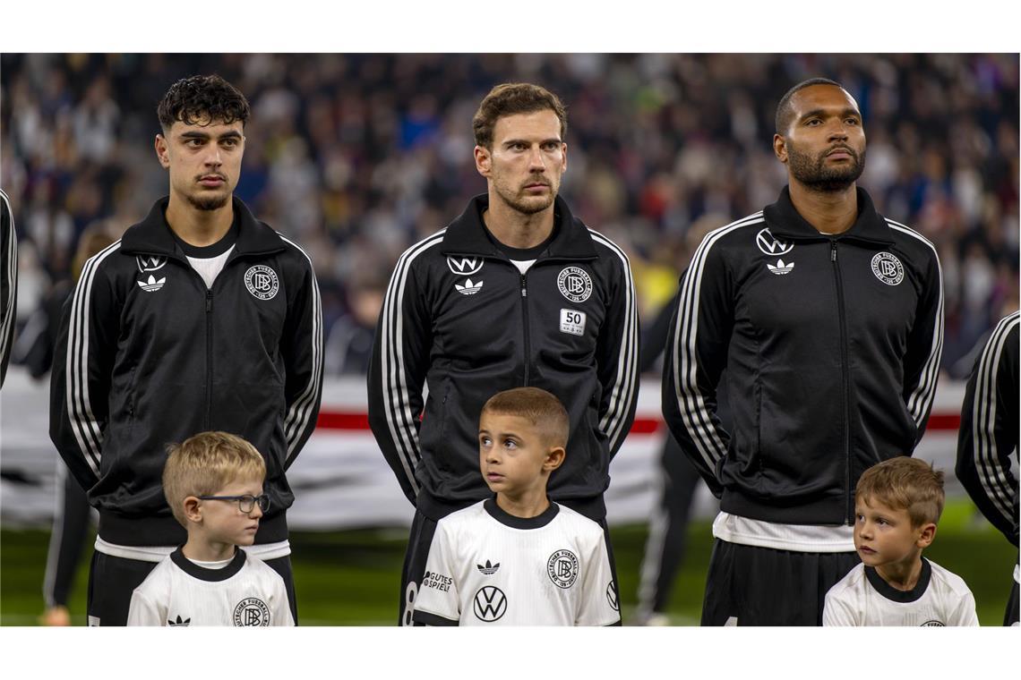 Drei Bayern-Profis, die der Nationalmannschaft Stabilität verleihen sollen: Aleksandar Pavlovic, Leon Goretzka und Jonathan Tah (von links)