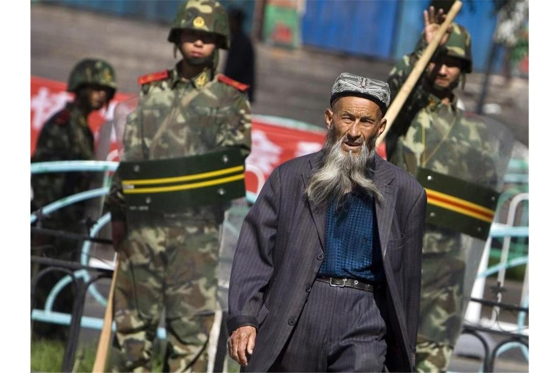 EU verlängert Sanktionen gegen China um ein Jahr Ein Angehöriger der uigurischen Minderheit in Ürümqi in der Unruheregion Xinjiang in Nordwestchina. Foto: Diego Azubel/dpa