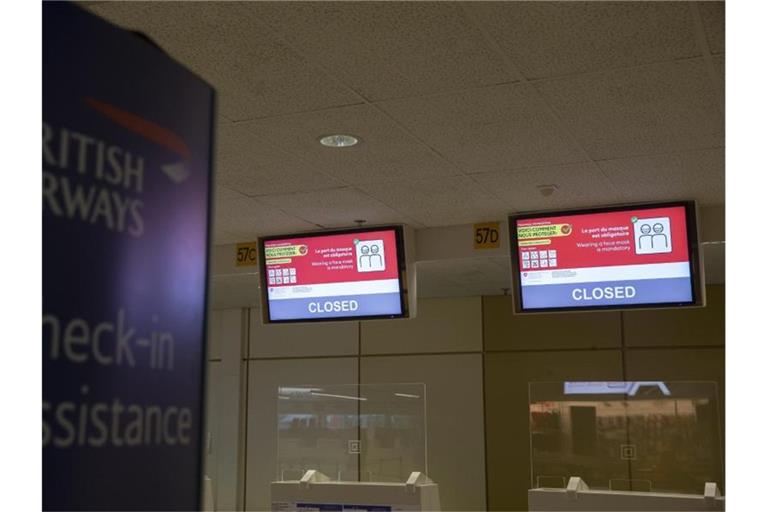 Ein geschlossener British-Airways-Schalter am Flughafen von Genf (Schweiz). Foto: Salvatore Di Nolfi/KEYSTONE/dpa