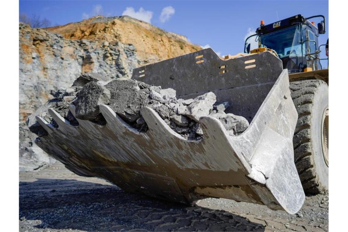 HeidelbergCement: Kosten für Anteilsverkäufe senken Gewinn