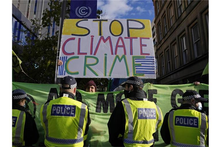 Ein Protest am Rande der COP26-Klimakonferenz in Glasgow. Symbolbild. Foto: Alastair Grant/AP/dpa