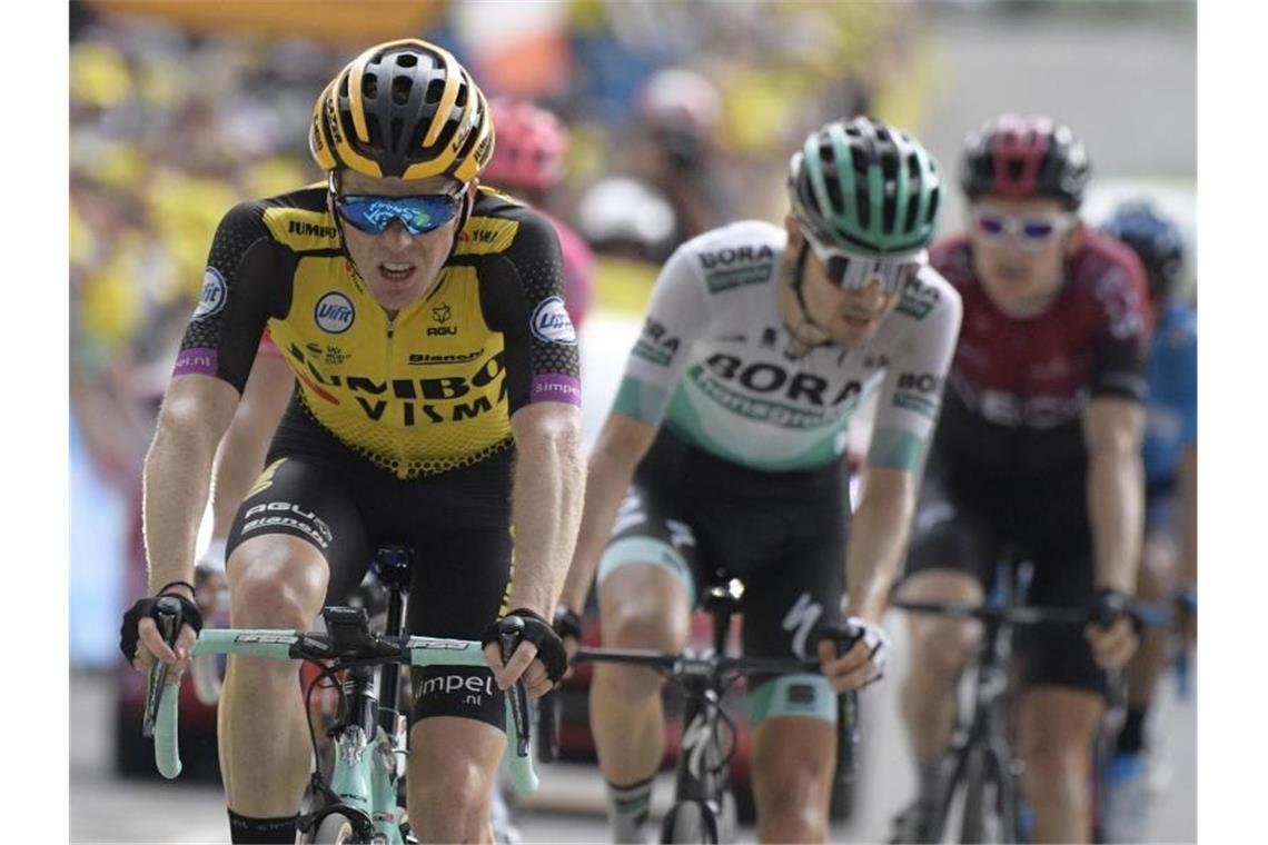 Bernal erobert Tour-Thron, Buchmann glücklicher Vierter Ein Top-10-Platz sollte es werden, mit Platz vier hat Emanuel Buchmann (r) alle Erwartungen übertroffen. Foto: Yorick Jansens/BELGA
