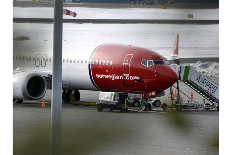 Eine Boeing 737 Max steht am Flughafen Vantaa in Finnland. Foto: Heikki Saukkomaa/Lehtikuva/dpa