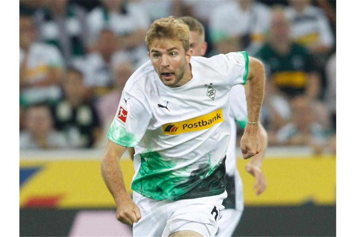 Gladbach als schmunzelnder Tabellenführer - Stindl zurück Eine Niederlage beim BVB könnte für Christoph Kramer und Gladbach den Sturz auf Rang sechs bedeuten. Foto: Roland Weihrauch/dpa