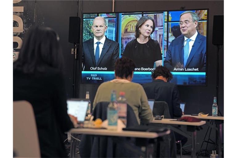Eine Woche vor der Bundestagswahl stellen sich Scholz, Baerbock und Laschet einem dritten TV-Triell. Foto: Kay Nietfeld/dpa