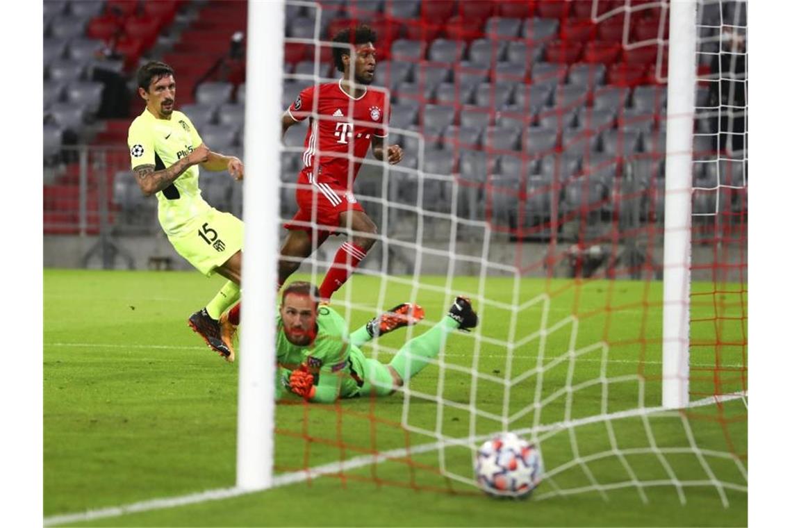 Nach Gnabry-Schreck: Perfekter Bayern-Start gegen Atlético Eingenetzt: Kingsley Coman brachte Bayern in Führung. Foto: Matthias Schrader/Pool AP/dpa