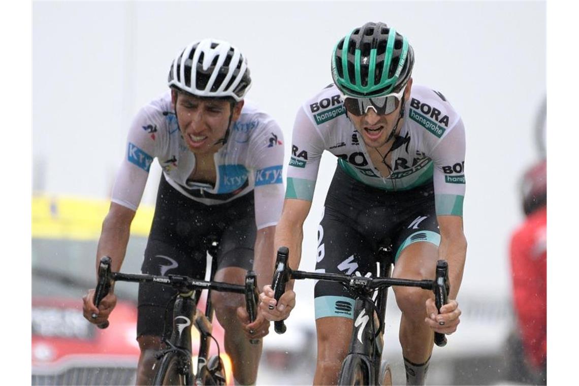 Emanuel Buchmann (r) und Egan Bernal bei der diesjährigen Tour-de-France. Foto: Yorick Jansens/BELGA