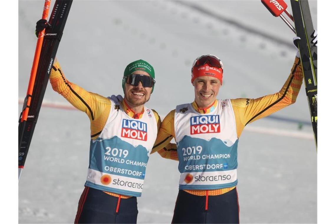 Eric Frenzel (r) und Fabian Rießle holten WM-Bronze. Foto: Karl-Josef Hildenbrand/dpa