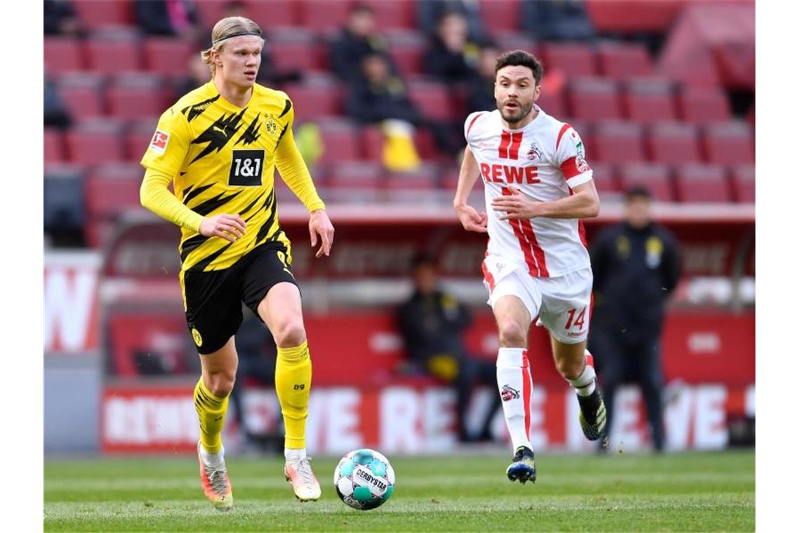 Erling Haaland bewahrte Borussia Dortmund vor eine Pleite beim 1. FC Köln. Foto: Marius Becker/dpa-Pool/dpa