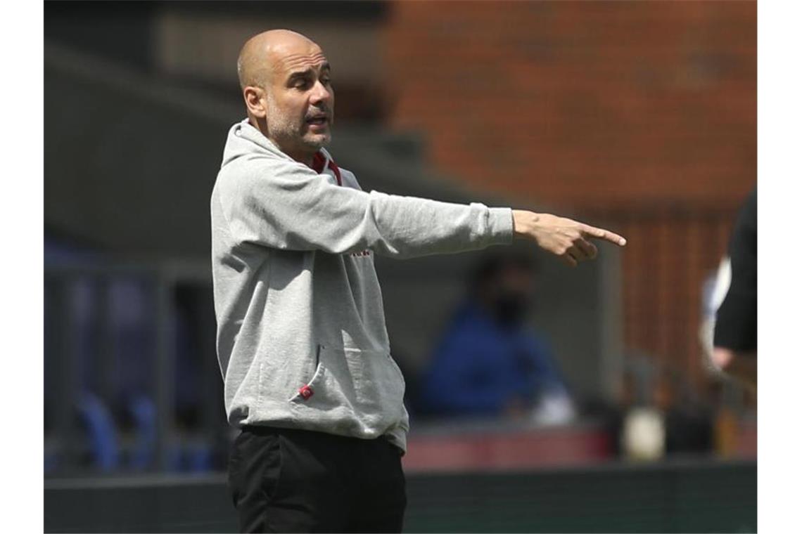 Guardiola erwartet „große Schlacht“ gegen Paris Erwartet gegen Paris Saint-Germain ein hartes Spiel: Pep Guardiola, Trainer von Manchester City. Foto: Steve Paston/Pool PA/dpa