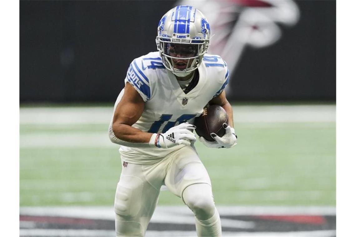 Nächste Bestmarke für Amon-Ra St. Brown Erzielte in der Partie gegen Seattle Seahawks zwei Touchdowns in einem Spiel:Amon-Ra St. Brown (l) von den Detroit Lions in Aktion. Foto: John Bazemore/AP/dpa