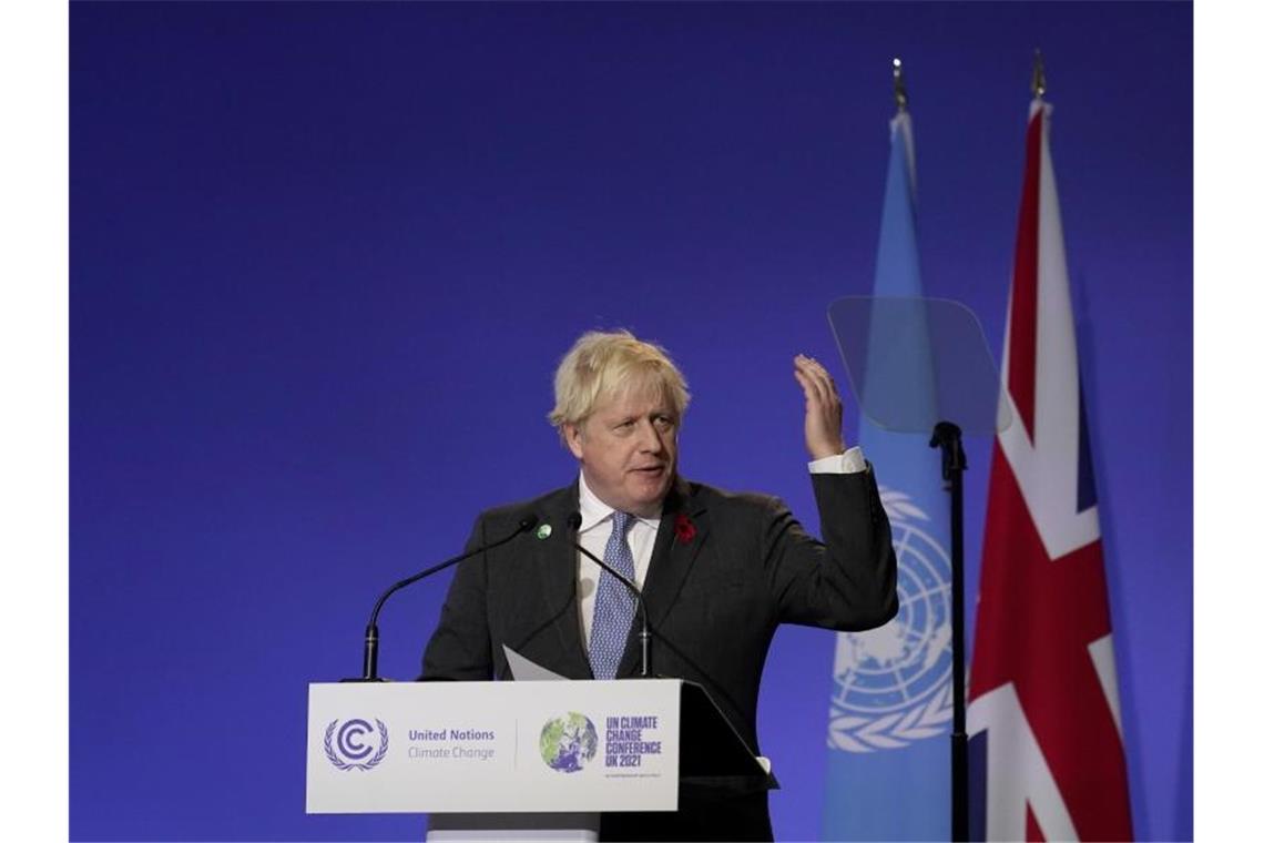 Warnungen zum COP26-Auftakt: „Schaufeln unser eigenes Grab“ „Es ist eine Minute vor Mitternacht auf der Uhr des Weltuntergangs“, sagte der britische Premierminister Boris Johnson zum Auftakt des UN-Klimagipfels COP26. Foto: Alberto Pezzali/AP/dpa