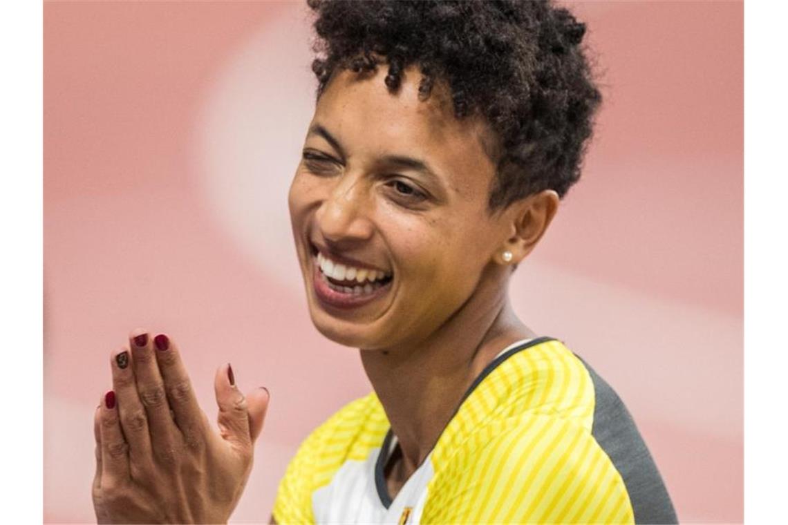 Favoritin Malaika Mihambo gewann bei der WM in Doha Gold im Weitsprung. Foto: Oliver Weiken/dpa